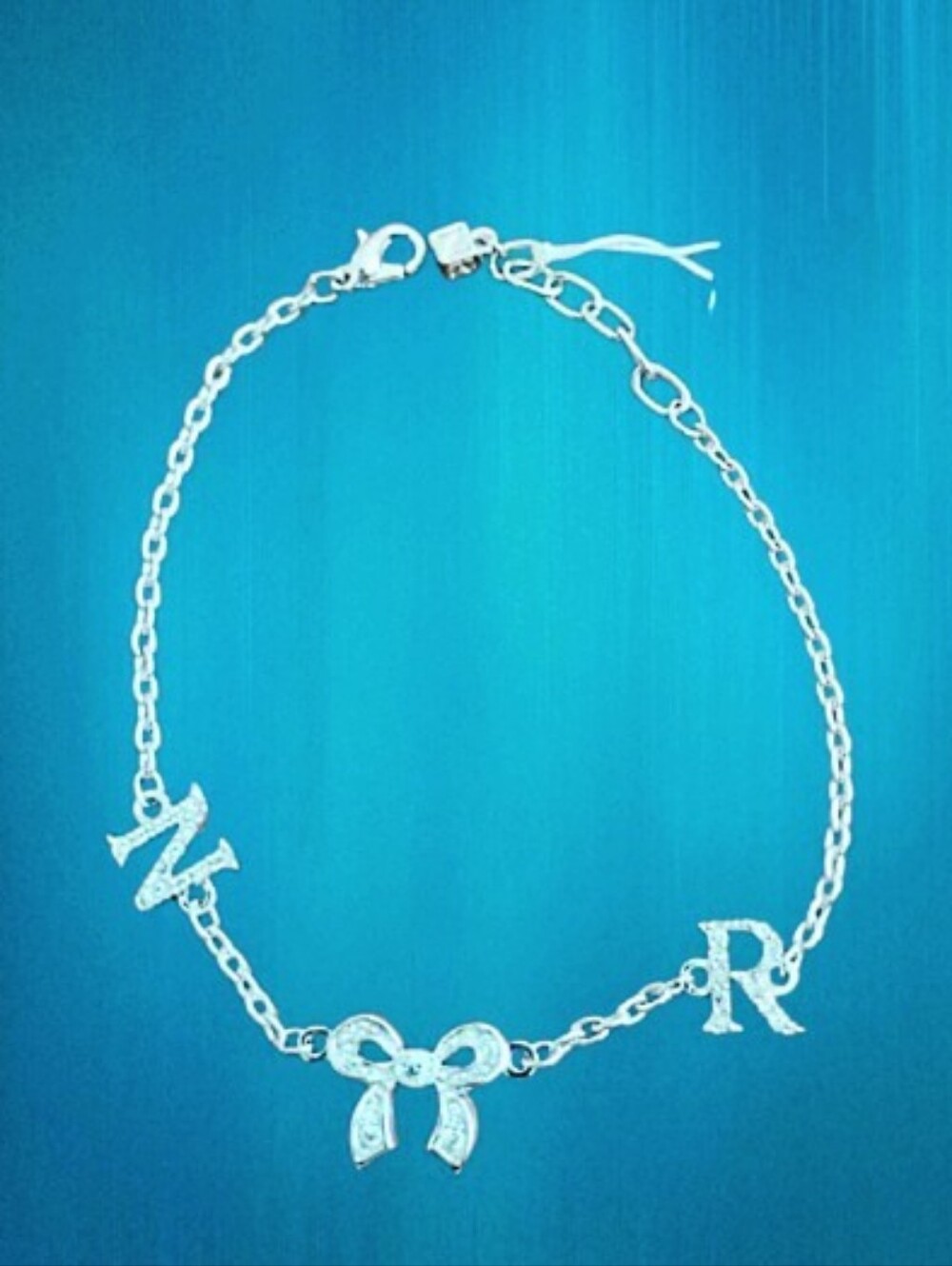 NWT Nina Ricci 8" Bracelet w/SHW - N, Bow, R
